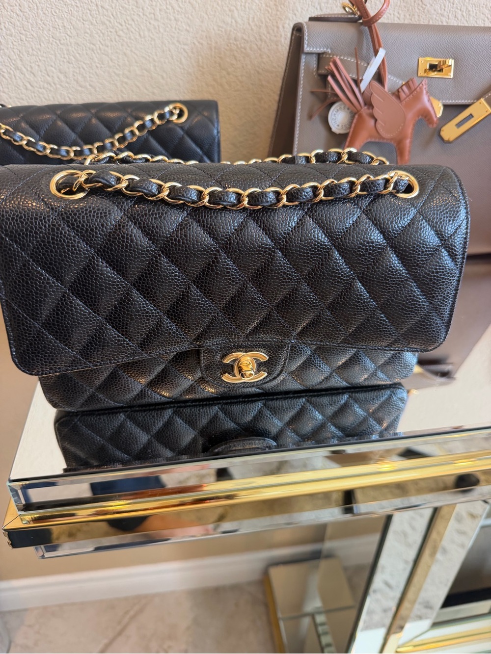 CHANEL Black Quilted Leather Shoulder Bag with Gold Chain Medium Caviar 2022